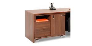 Sadaf filing cabinet offers a drawer to place personal and office items as well as a file storing drawer. The option of adding it under the L-shaped desk is available. It is also equipped with a cable entry cap.